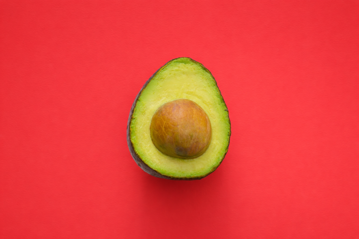 Avocado photo on a red background