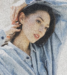 Woman wearing a blue shirt and a hat, with her hand on her head — sample image to denoise