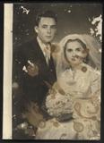 Water-damaged photo, try AI restoration