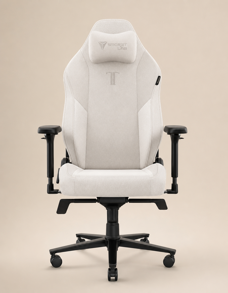 A white gaming chair with a high backrest and armrests on a beige background, upholstered in white fabric, with a cushioned seat and adjustable height. Original uploaded product photo. A white gaming chair with a high backrest and armrests on a beige background, upholstered in white fabric, with a cushioned seat and adjustable height. Original uploaded product photo.