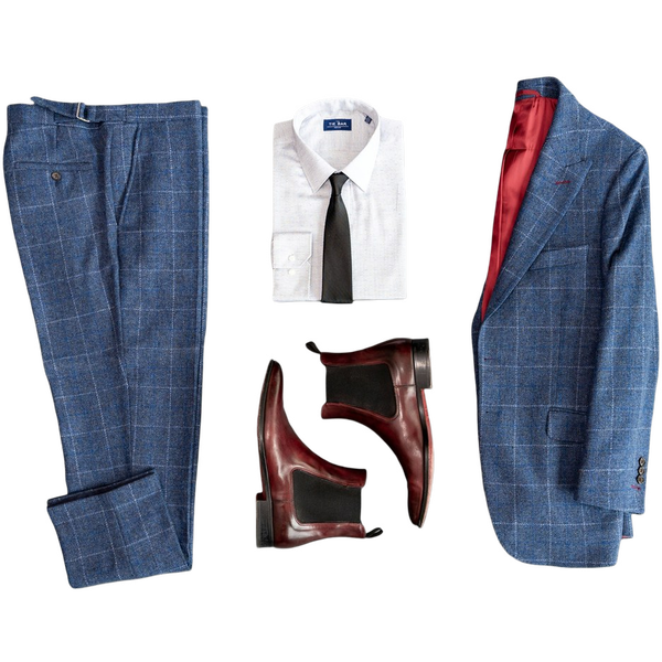 A blue checked suit laid out flat with a shirt, tie and boots — background removed by iLoveIMG