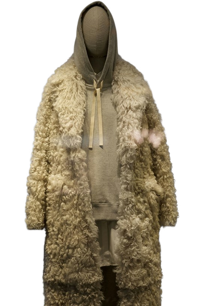 A cream shearling coat on a headless mannequin — background removed by iLoveIMG