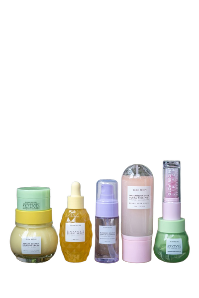 A shelf of pastel skincare bottles in front of houseplants — background removed by Photoroom