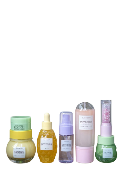 A shelf of pastel skincare bottles in front of houseplants — background removed by Remove.bg