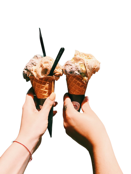 Two hands holding ice cream cones together — background removed by Remove.bg