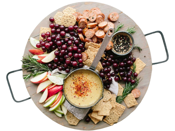 A grazing board of fruit, crackers and dips — background removed by iLoveIMG