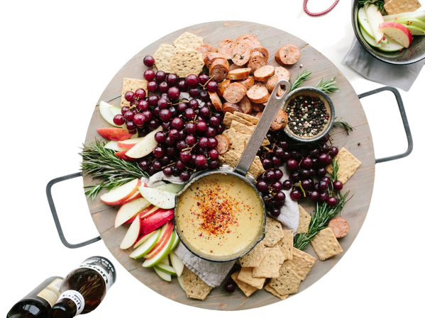 A grazing board of fruit, crackers and dips — background removed by Remove.bg