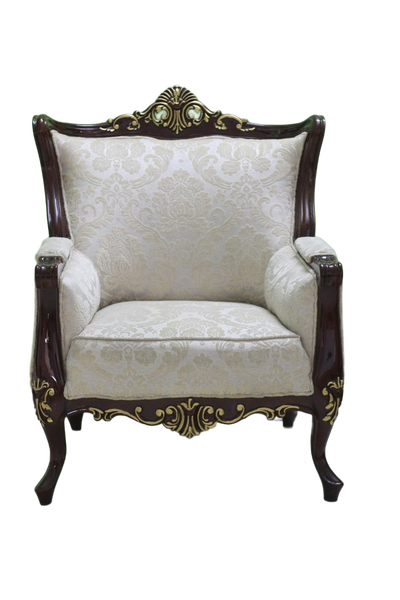An ornate carved armchair against a green wall — background removed by Erase.bg
