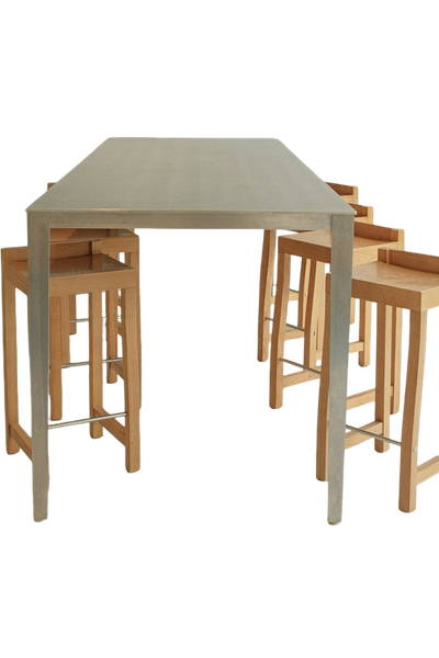 A pale dining table with stools tucked underneath — background removed by iLoveIMG