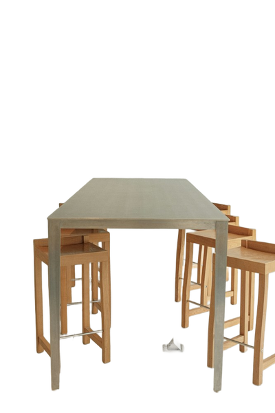 A pale dining table with stools tucked underneath — background removed by Erase.bg