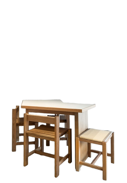 A wooden table with two nested stools — background removed by Photoroom