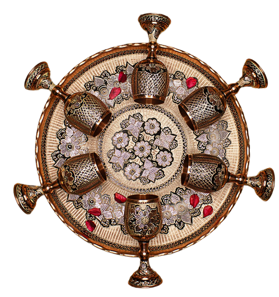A brass wall ornament with candle holders around its rim — background removed by Erase.bg