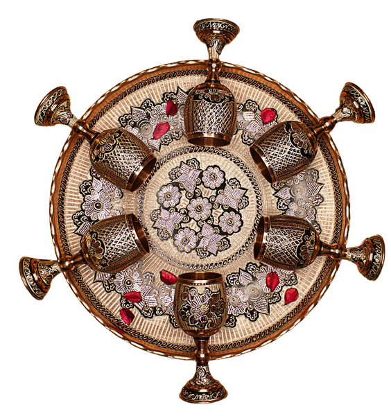 A brass wall ornament with candle holders around its rim — background removed by Photoroom