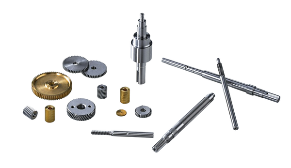 Shafts, gears and washers laid out on a blue surface — background removed by Photoroom