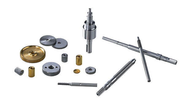 Shafts, gears and washers laid out on a blue surface — background removed by Remove.bg