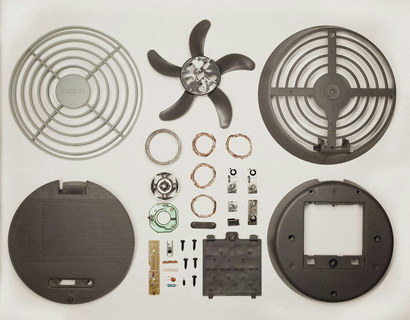 A fan assembly laid out as separate components