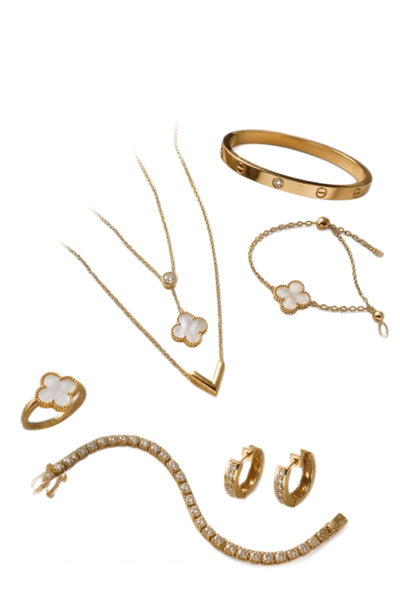 A flat-lay of gold necklaces, bangles, a ring and hoop earrings on beige satin — background removed by Remove.bg