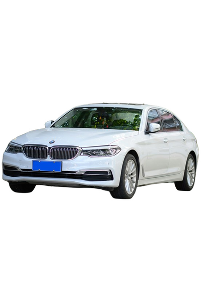 A white saloon car parked on a tree-lined street — background removed by iLoveIMG