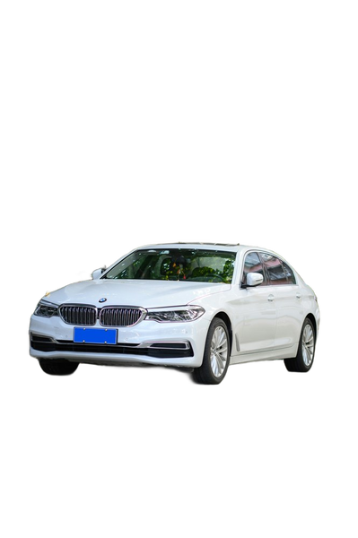 A white saloon car parked on a tree-lined street — background removed by Erase.bg
