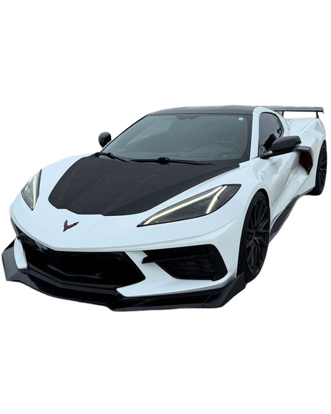 A white sports car with a carbon bonnet on a rooftop car park — background removed by iLoveIMG