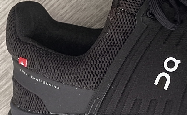 Close-up of a black mesh running shoe — upscaled by Nano Banana 2