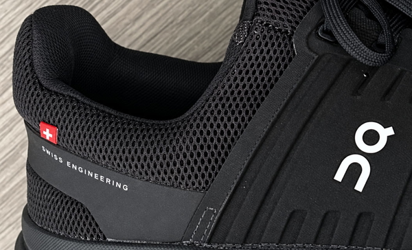 Close-up of a black mesh running shoe — upscaled by GPT Image 2.5