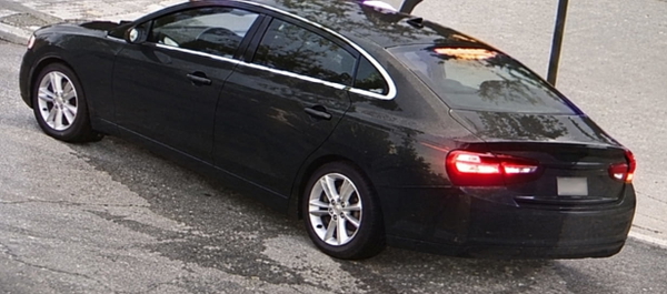 Dark sports car in motion, lit from the side — upscaled by GPT Image 2.5