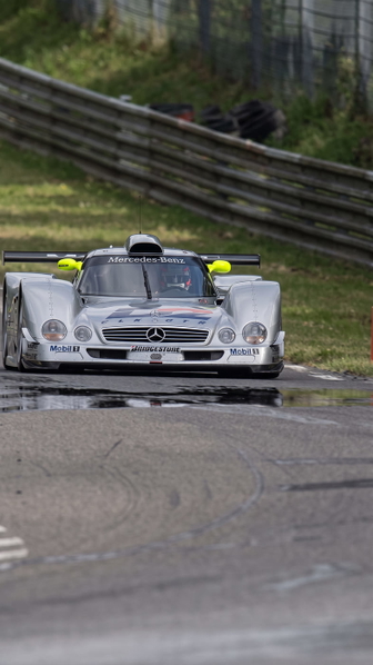 White racing prototype on a circuit, from a low angle — upscaled by Nano Banana 2