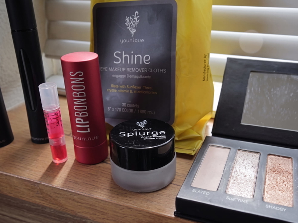 Make-up products on a shelf, including a packaged product with small printed text — upscaled by Nano Banana 2