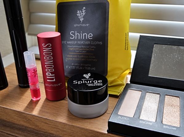 Make-up products on a shelf, including a packaged product with small printed text — upscaled by GPT Image 2.5