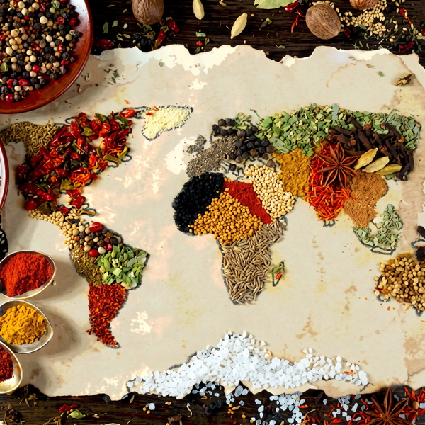 World map laid out in coloured spices and grains on a pale surface — upscaled by Nano Banana 2