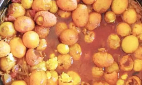 Close-up of oranges and citrus fruit filling the frame