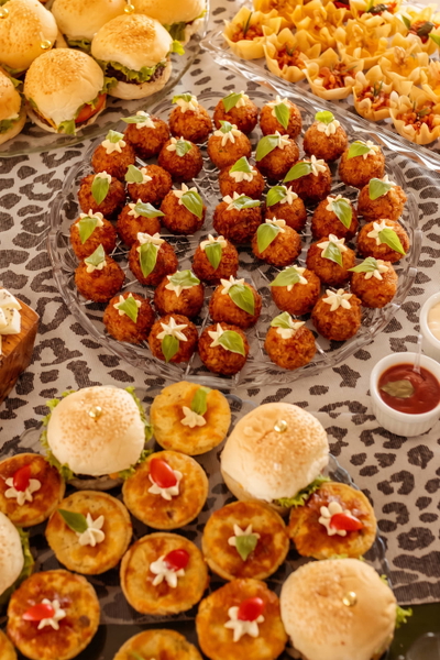 Catering platter of canapés, tartlets and stuffed strawberries, at 17.26 MP — upscaled by Nano Banana 2