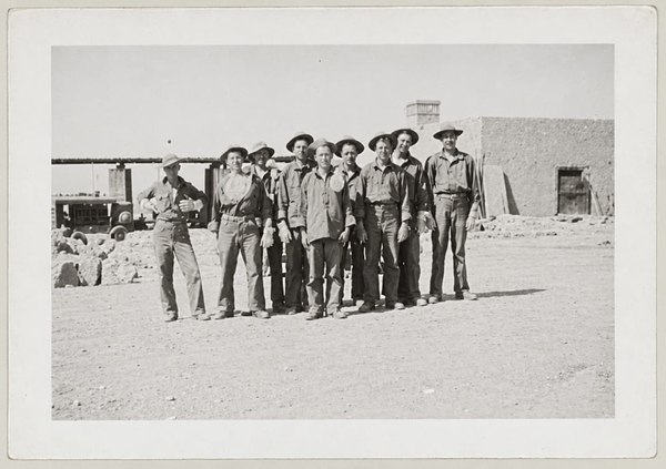 Archive print of a row of men standing outside a building, mounted on card — upscaled by GPT Image 2.5