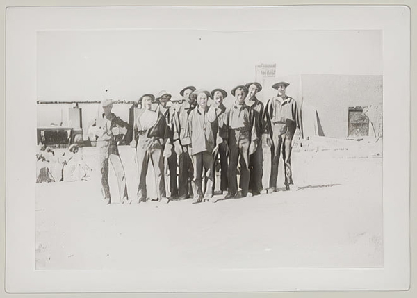 Archive print of a row of men standing outside a building, mounted on card — upscaled by GoStudio Pro