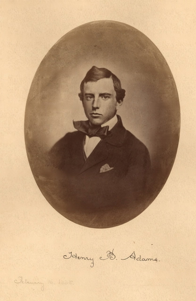 Oval sepia portrait of a young man in a bow tie, with a handwritten name, date and place below — watermark removed by GoStudio Pro