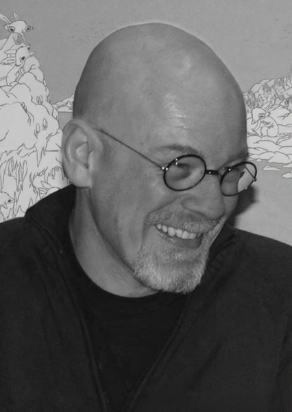 Black-and-white portrait of a bald man in round glasses, laughing, in front of a line-drawing mural — watermark removed by GoStudio Pro