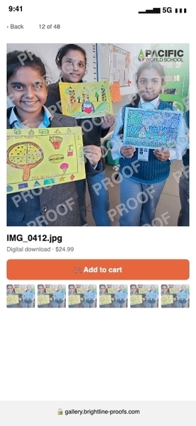 Phone screenshot of a photo gallery showing three schoolchildren holding drawings