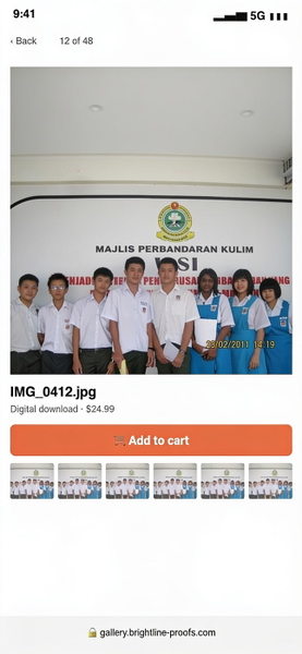 Phone screenshot of a gallery showing a group of students in front of a banner — watermark removed by GoStudio Advanced