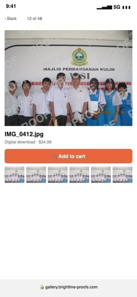 Phone screenshot of a gallery showing a group of students in front of a banner