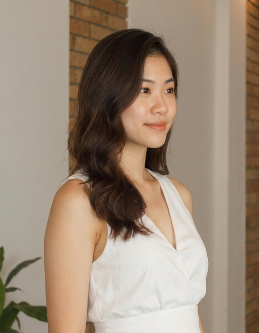 A woman in a white dress stands before a brick wall with a plant to her left, re-rendered from a three-quarter right (45°) camera angle by AI. A woman in a white dress stands before a brick wall with a plant to her left, re-rendered from a three-quarter right (45°) camera angle by AI.