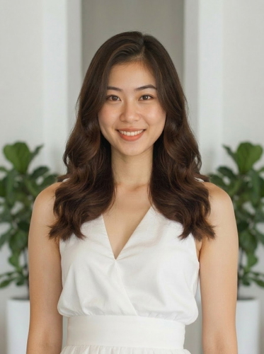 A woman in a white dress stands in front of a plant, with a wall in the background, captured at eye level by an AI perspective changer. A woman in a white dress stands in front of a plant, with a wall in the background, captured at eye level by an AI perspective changer.