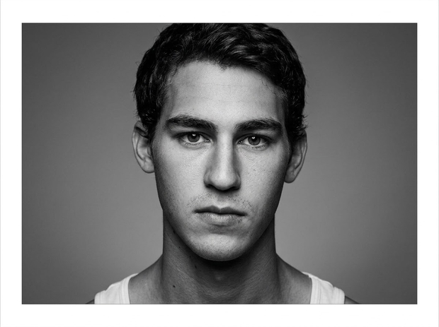 The same portrait with smoothed skin, brighter eyes, and balanced lighting The same portrait with smoothed skin, brighter eyes, and balanced lighting