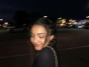 Portrait of a woman in a black dress on a night street, before lighting correction in the portrait enhancer