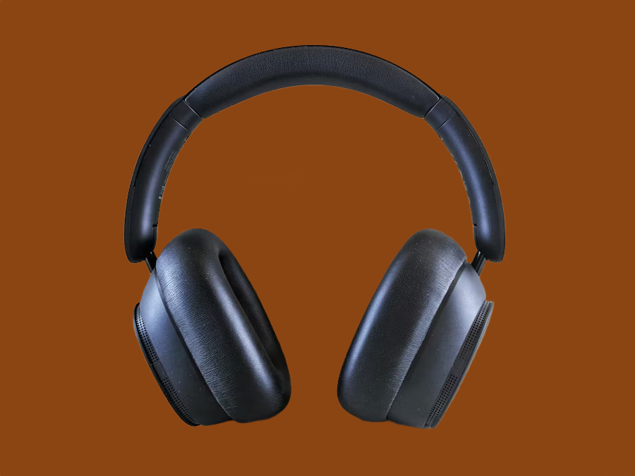 Black over-ear headphones on a brown background after AI background removal Black over-ear headphones on a brown background after AI background removal