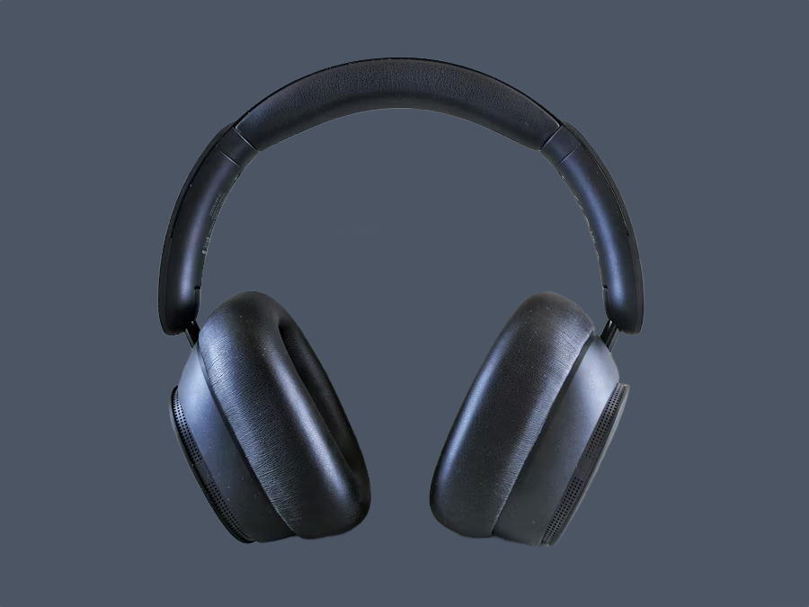 Black over-ear headphones on a grey background after AI background removal Black over-ear headphones on a grey background after AI background removal