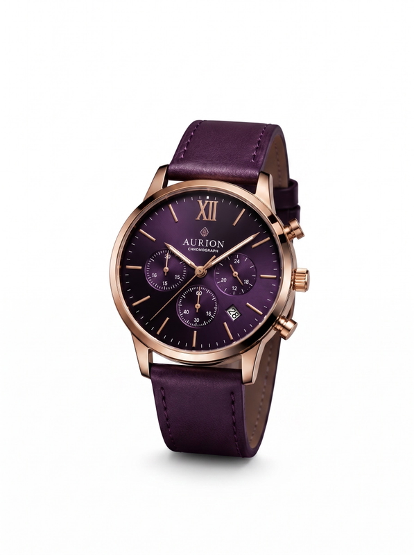 The image shows an aurion chronograph watch with a rose gold case and a purple leather strap. The watch has a round face with a black dial and silver-tone hands and markers. The strap is made of a soft, supple leather and has a buckle closure.