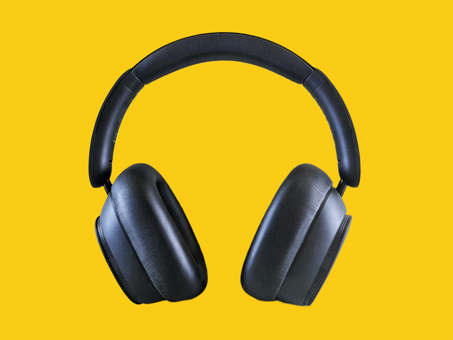 Black over-ear headphones on a yellow background after AI background removal Black over-ear headphones on a yellow background after AI background removal