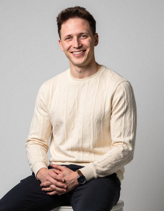 Professional AI-generated headshot showing a person in business attire