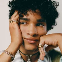 Sample photo with rings, a bracelet and a pendant necklace, try the AI accessory remover